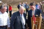 Kalas Village Groundbreaking: Tennent and unidentified man with shovel
