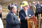 Kalas Village Groundbreaking: Tennent and unidentified man with shovel
