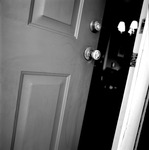 White Door Partially Open by Asbury Theological Seminary Communications