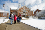 Korean Family Walking on Snowy Campus by Asbury Theological Seminary Communications