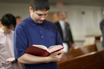 A Male Student Singing in Estes Chapel by Asbury Theological Seminary Communications
