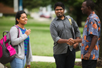 International Students Shaking Hands on Campus by Asbury Theological Seminary Communications