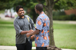 International Students Shaking Hands on Campus - 2 by Asbury Theological Seminary Communications