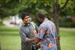 International Students Shaking Hands on Campus - 3 by Asbury Theological Seminary Communications