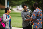International Students Shaking Hands on Campus - 4 by Asbury Theological Seminary Communications
