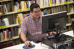 A Male Student Using a Computer in Orlando by Asbury Theological Seminary Communications