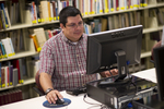A Male Student Using a Computer in Orlando - 2 by Asbury Theological Seminary Communications