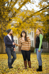 Three Students in the Fall Leaves by Asbury Theological Seminary Communications