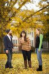 Three Students in the Fall Leaves - 2 by Asbury Theological Seminary Communications