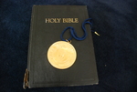 The Presidential Medal on Top of a Closed Bible - 2 by Asbury Theological Seminary Communications