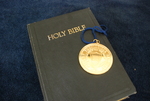 The Presidential Medal on Top of a Closed Bible - 4 by Asbury Theological Seminary Communications