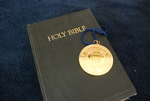 The Presidential Medal on Top of a Closed Bible - 5 by Asbury Theological Seminary Communications