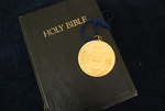 The Presidential Medal on Top of a Closed Bible - 6 by Asbury Theological Seminary Communications