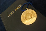 The Presidential Medal on Top of a Closed Bible - 10 by Asbury Theological Seminary Communications