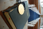 The Presidential Medal on Top of a Closed Bible in Estes Chapel by Asbury Theological Seminary Communications