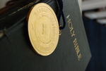 The Presidential Medal on Top of a Closed Bible - 13 by Asbury Theological Seminary Communications
