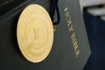 The Presidential Medal on Top of a Closed Bible - 14 by Asbury Theological Seminary Communications