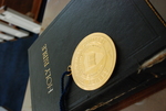 The Presidential Medal on Top of a Closed Bible - 15 by Asbury Theological Seminary Communications