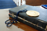 The Presidential Medal on Top of a Closed Bible in Estes Chapel - 4 by Asbury Theological Seminary Communications