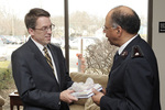 Dr. Tim Tennent Receiving a Gift from a Salvation Army Officer by Asbury Theological Seminary Communications