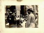 George B. Ellis handing out tracts at street meeting in New York City