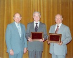 Abbott, J D awarding Holiness Exponent of the Year Award to Richard and Willard Taylor