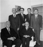 ESJ pictured with a group of men