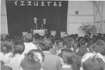 ESJ preaching in Kyoto, Fukko, Japan with a translator with a clearer view of the attendees