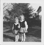 Anne and Janice Mathews, grandaugthers of ESJ as young children in matching plaid skirts
